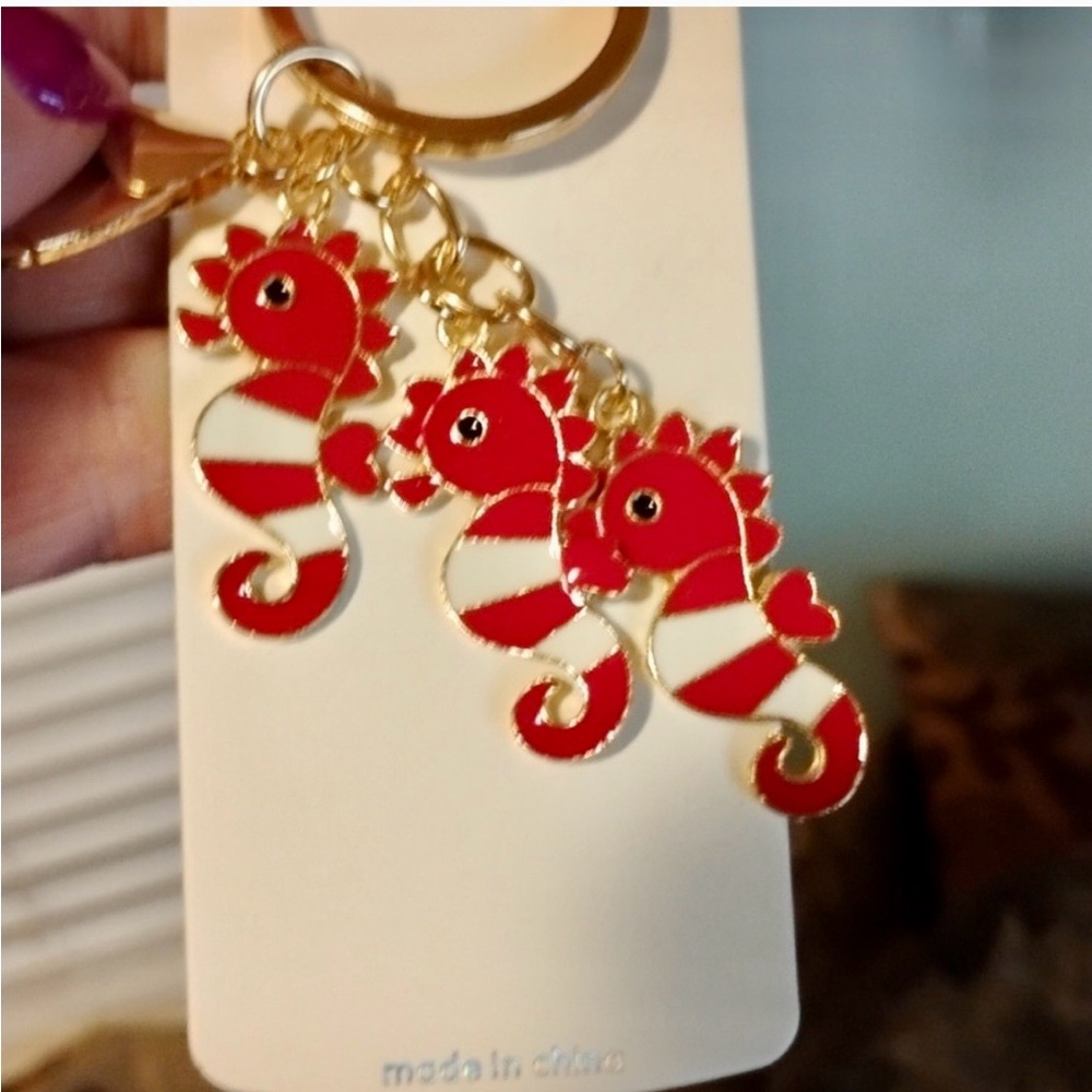Red seahorses bag charm